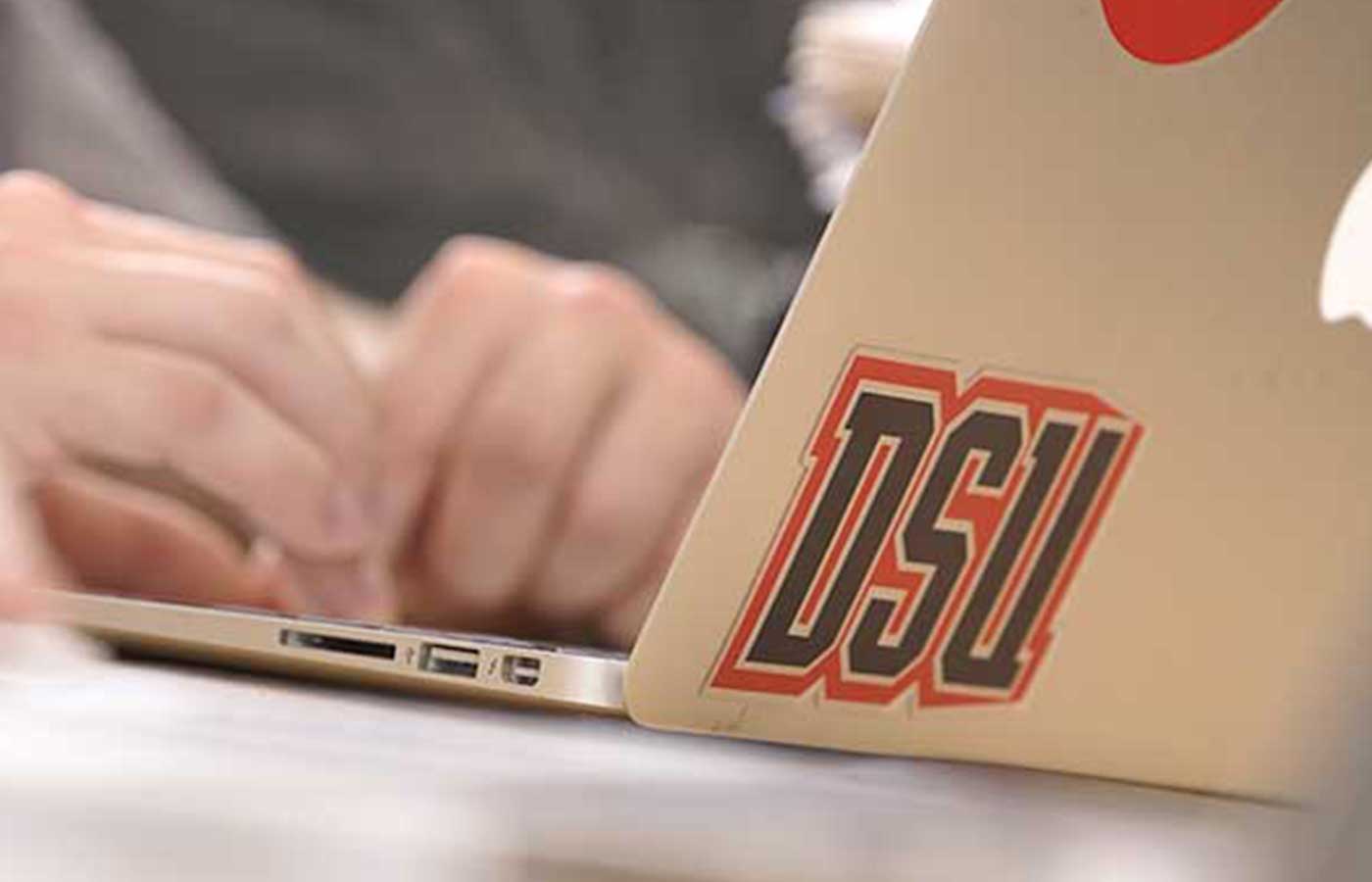Laptop with DeSales University Sticker
