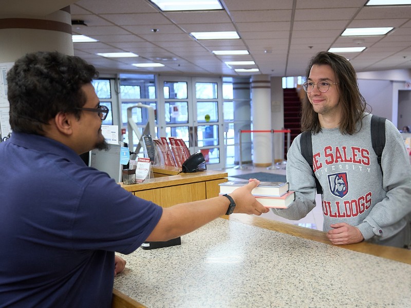 ipad with the DeSales logo