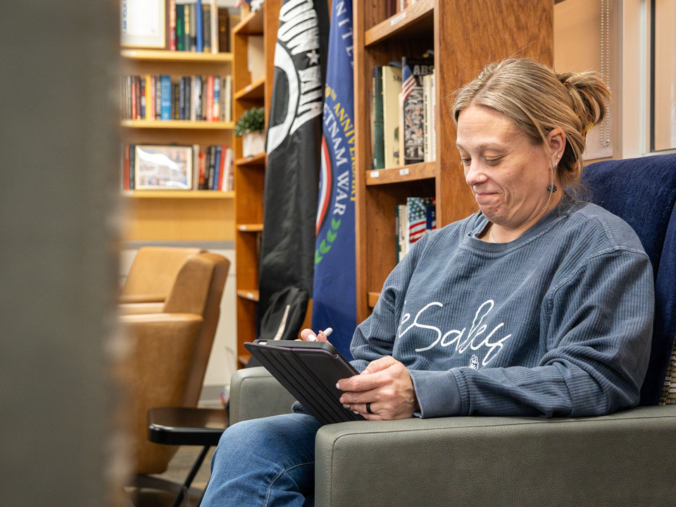 adult student in veterans lounge