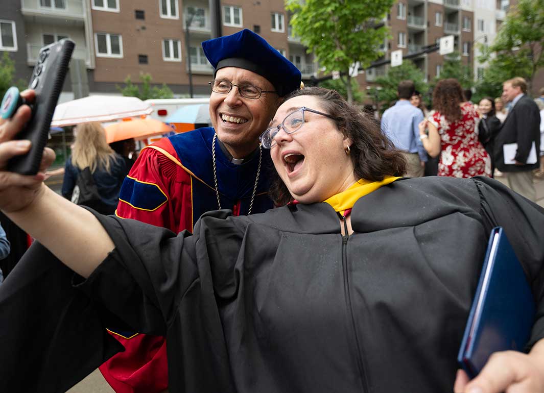 graduating student with the president