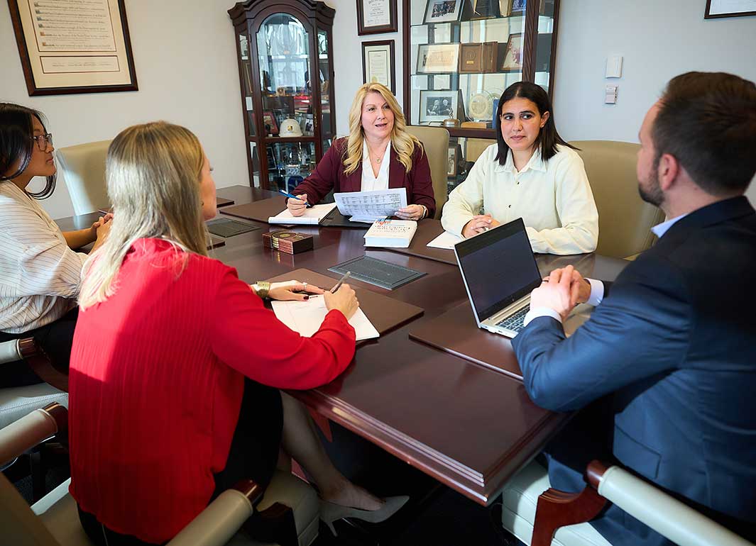 students in a business meeting
