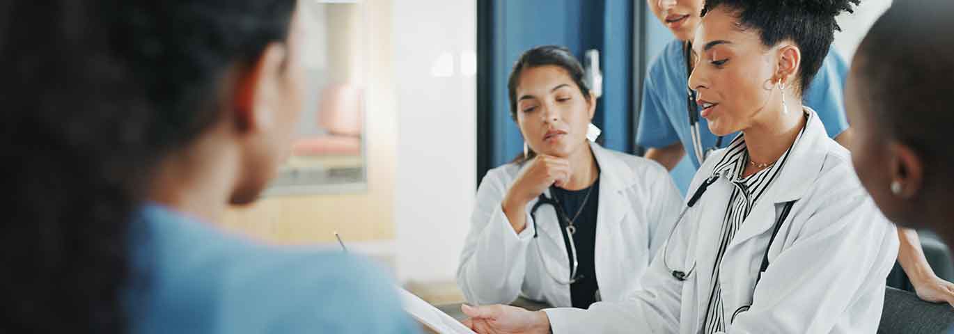 doctors reviewing charts