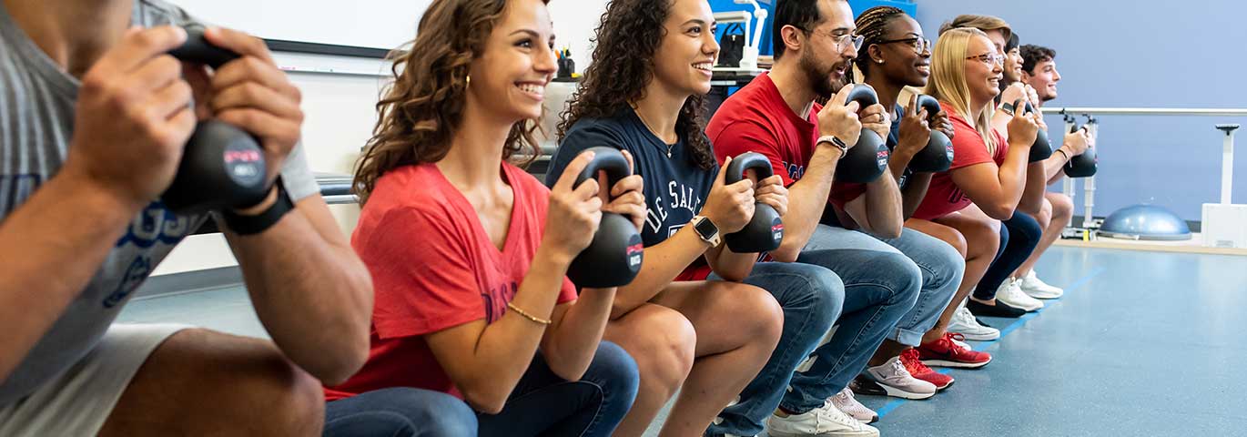 students working in a physical therapy clinic