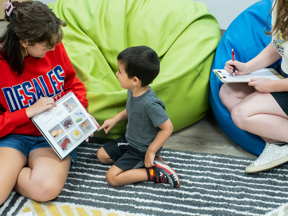 child receiving speech therapy