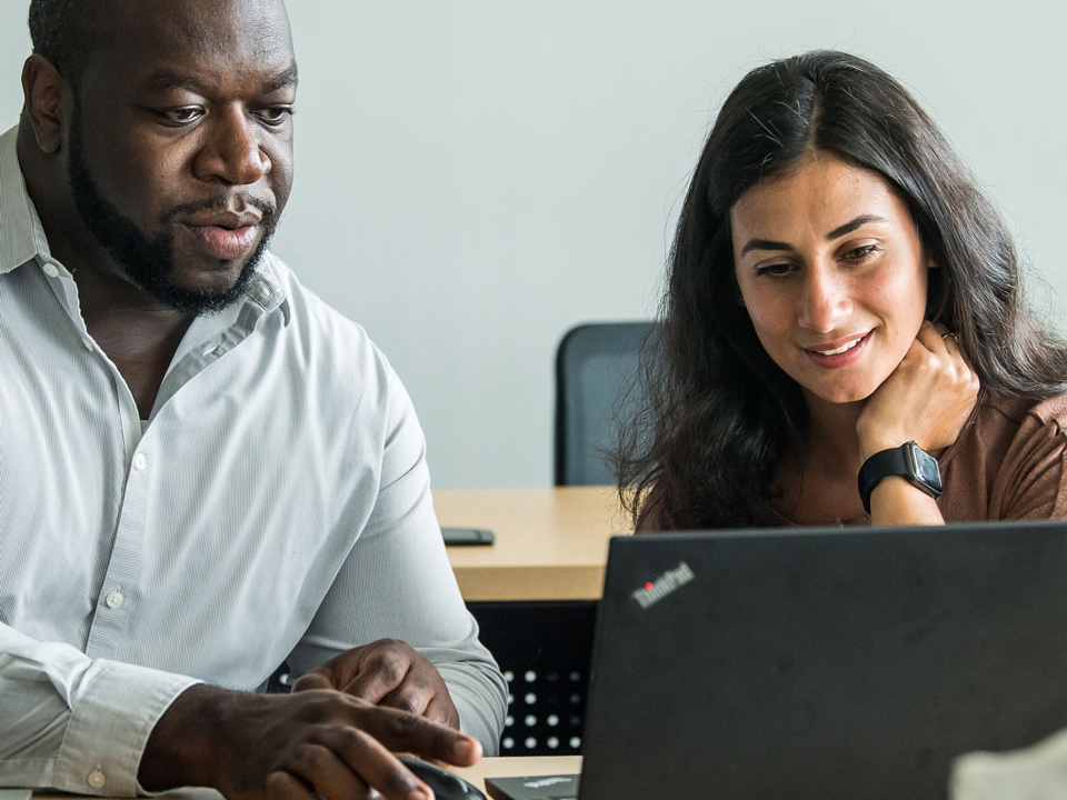 students looking at a computer