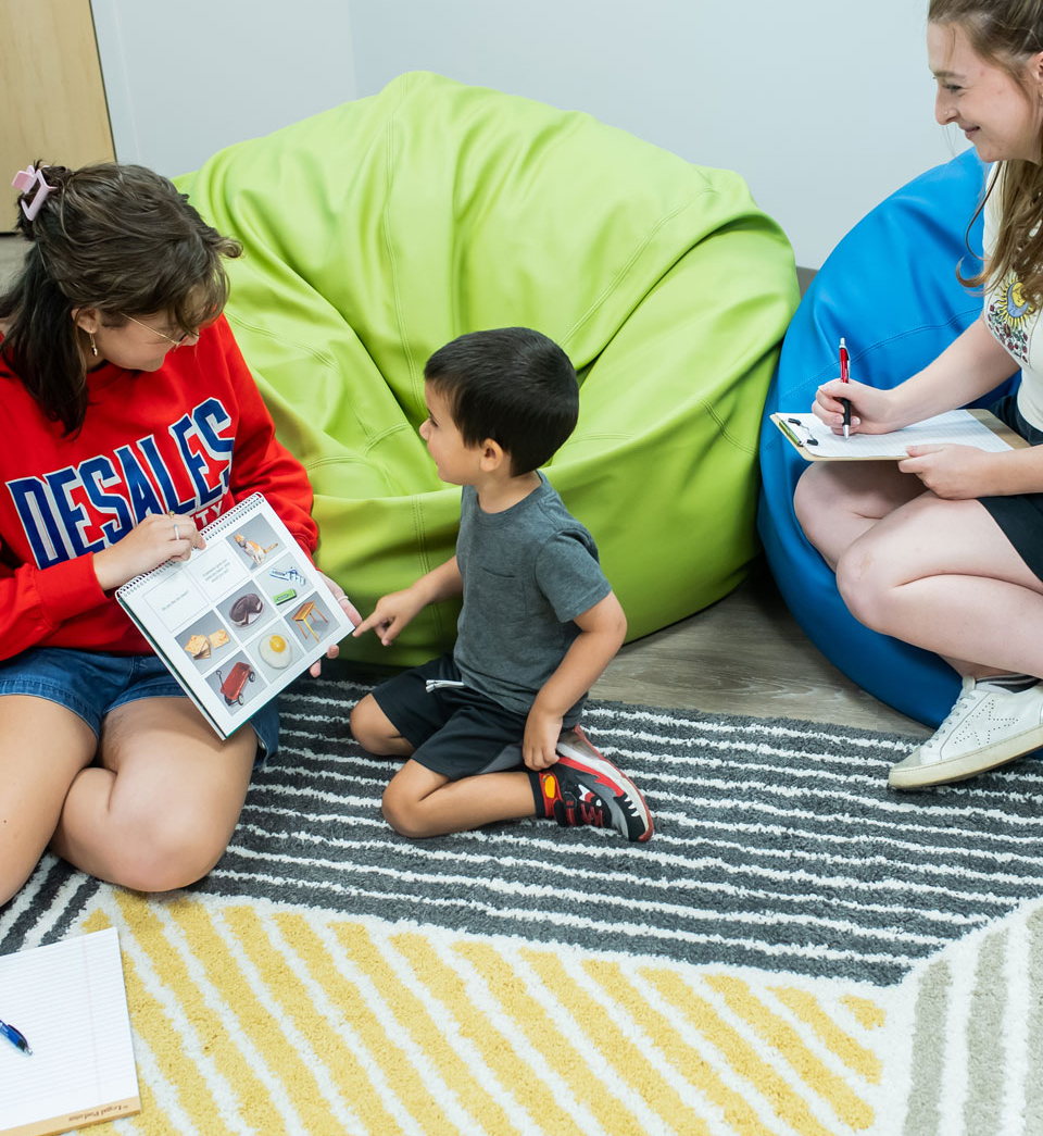 student reading to a child