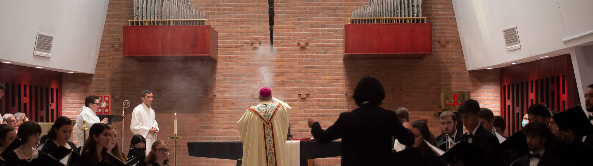 priest standing at an altar