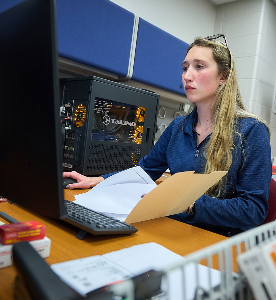 girl looking at a computer