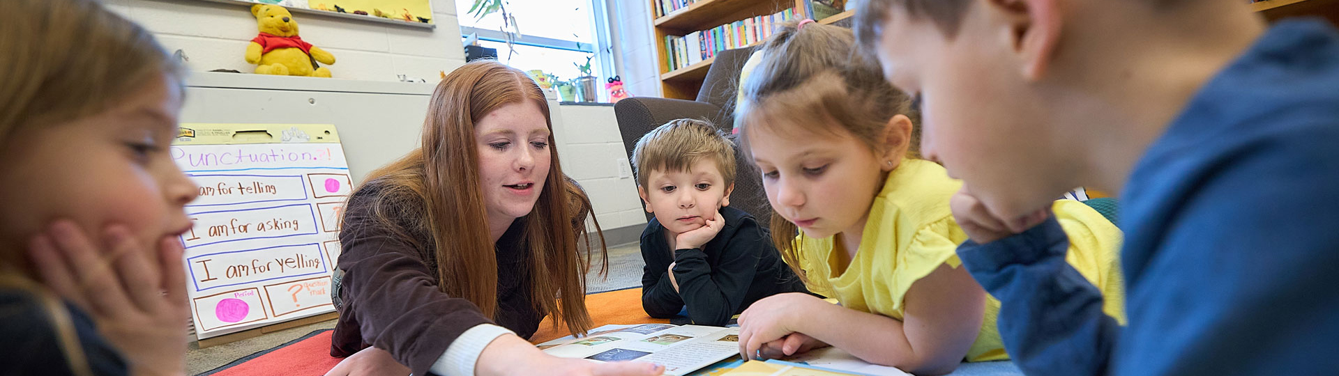 student teaching a classroom of children