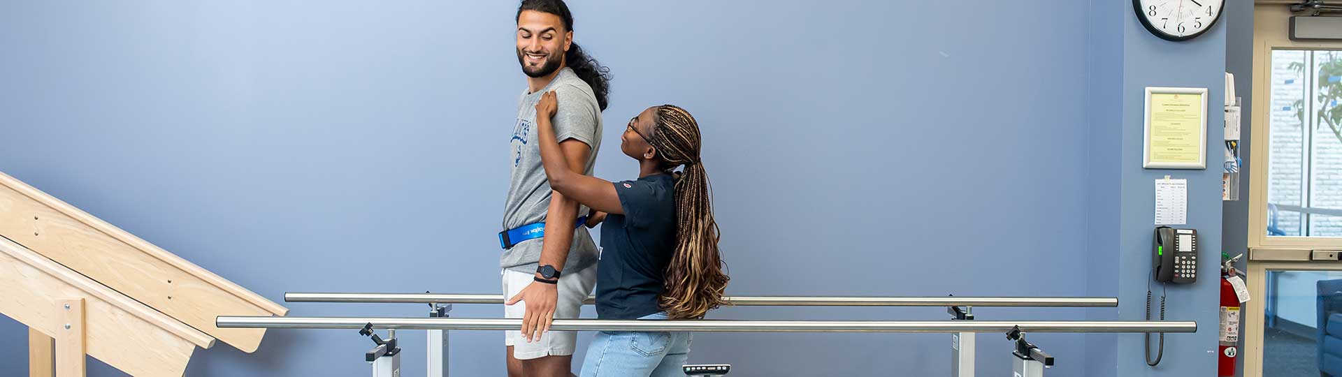 students working in a physical therapy clinic