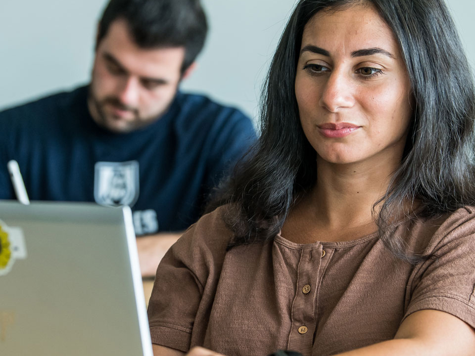 girl looking at a computer