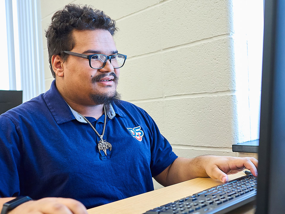 student at laptop