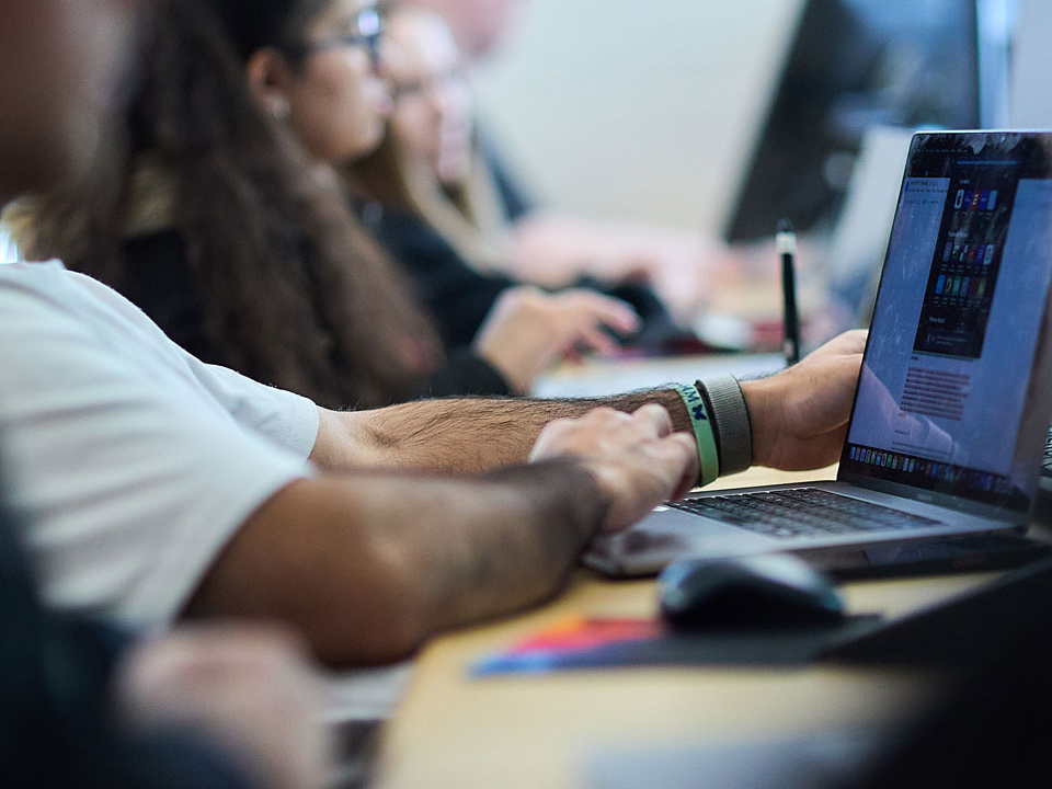 students on a computer