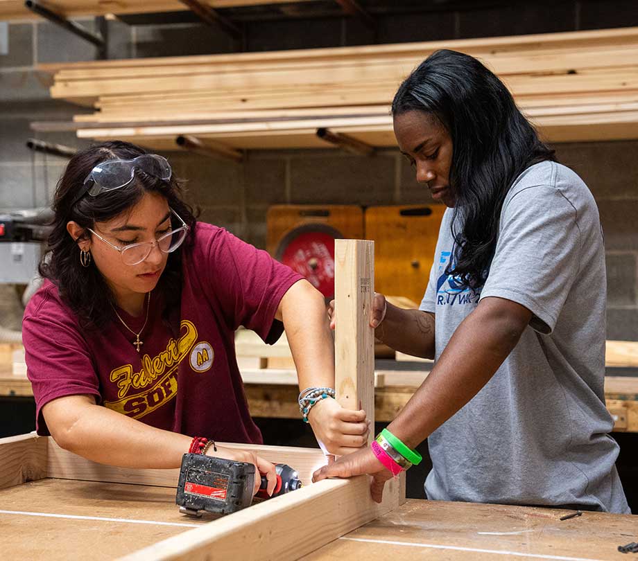 students building a theatre set