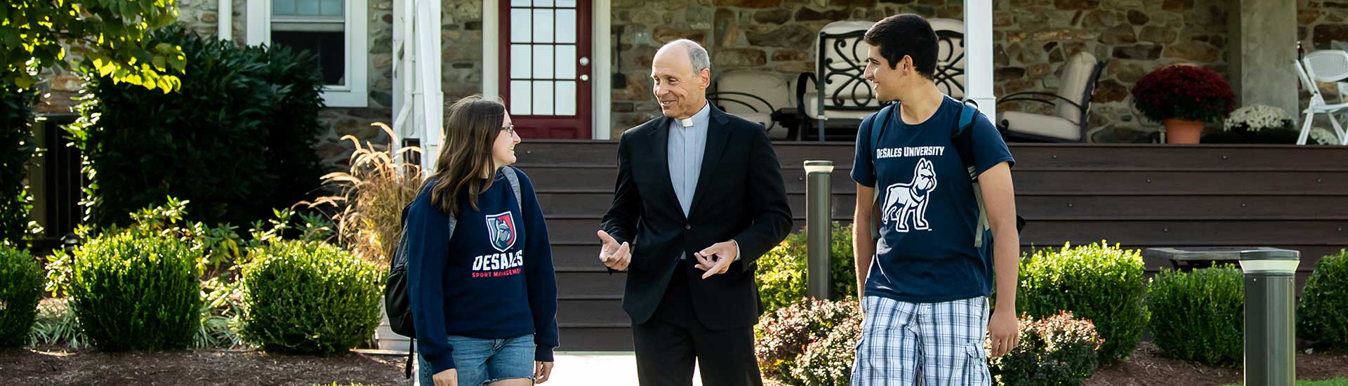 father jim talking to students