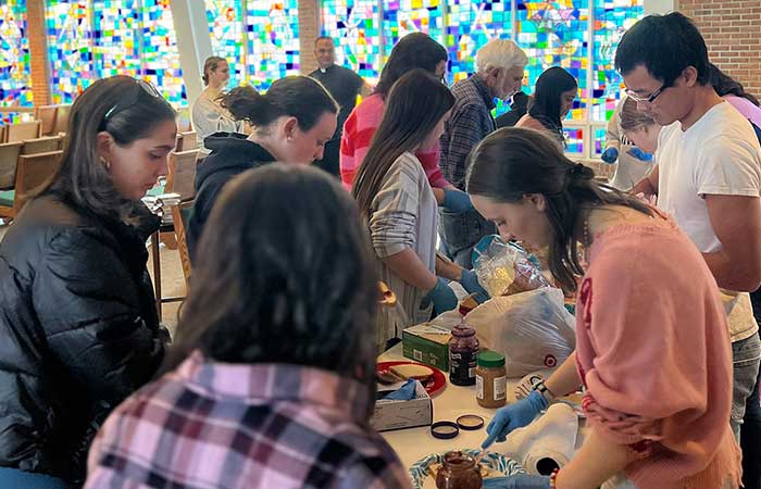 Students making sandwiches for local shelters