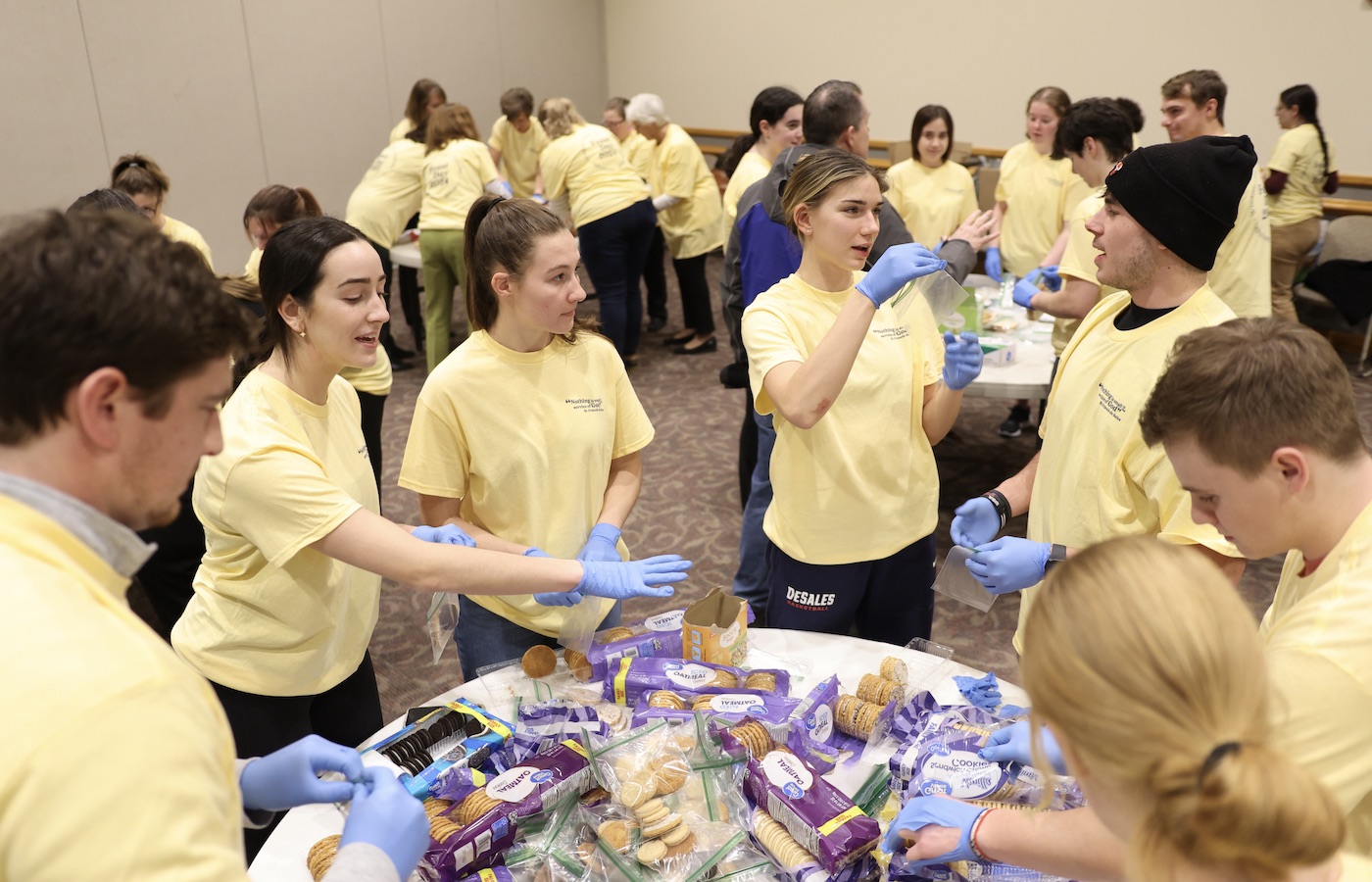 Students assembling warm-weather packages