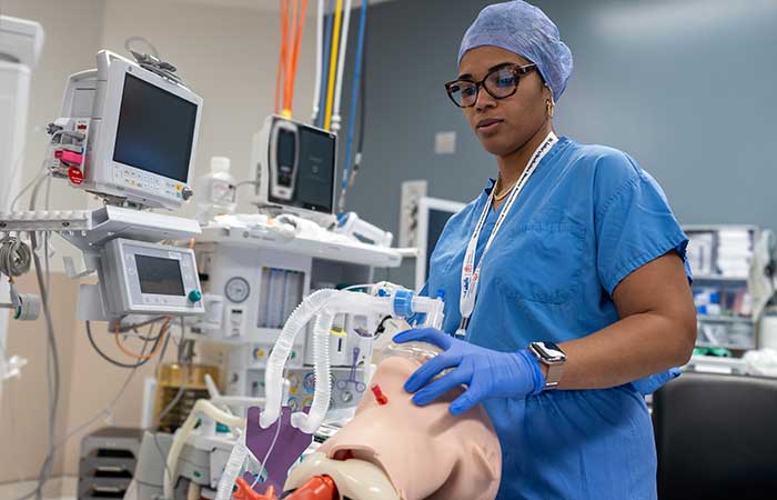 nurse anesthetist practicing on a manikin