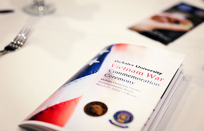 a ceremony program on a table