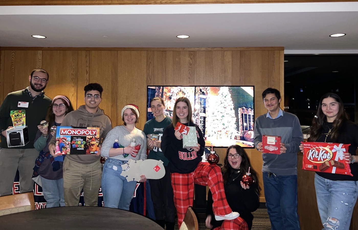 Student celebrating Christmas with a gift exchange