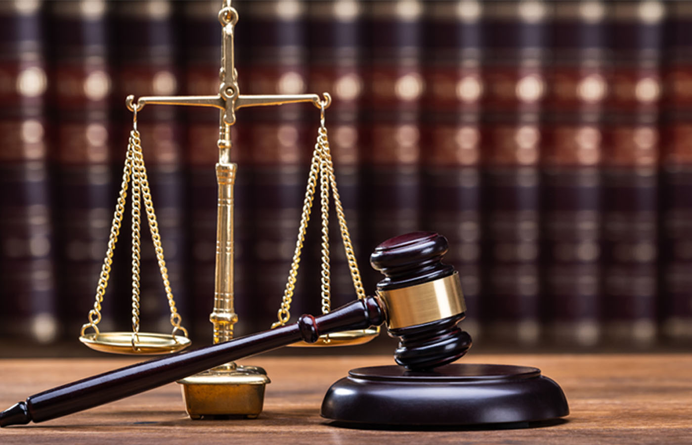 Gavel and justice scale in library